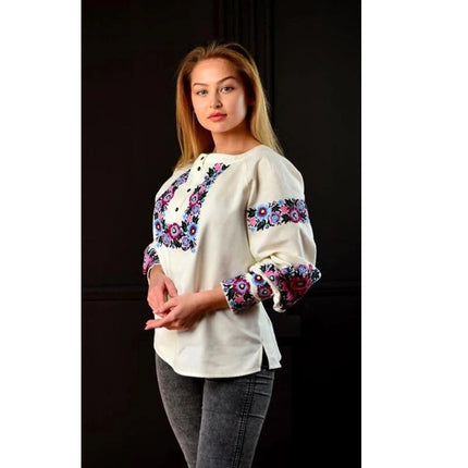 Designer women's embroidered blouse with a cashmere jacket