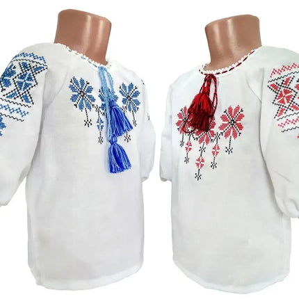 Embroidered blouse for a girl with a geometric ornament