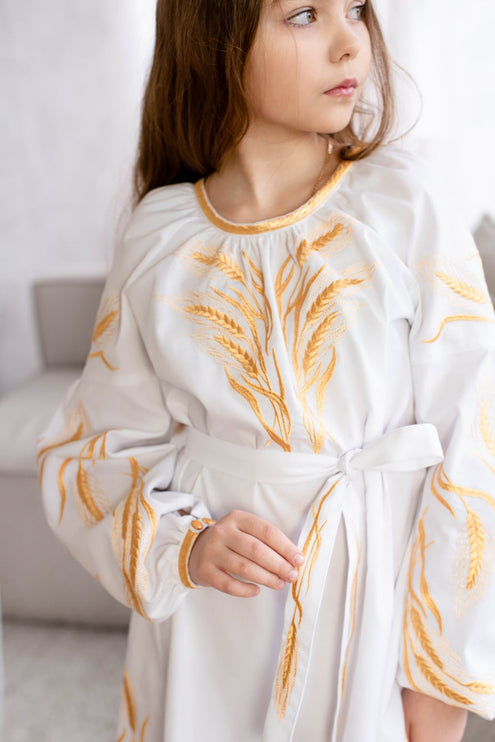 Embroidered dress for a girl with ears of wheat
