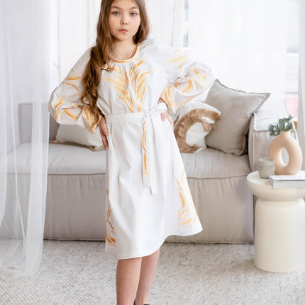 Embroidered dress for a girl with ears of wheat