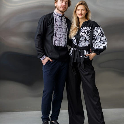 Embroidered women's blouse with a waist belt and button-down style