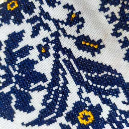 White women's dress with embroidery