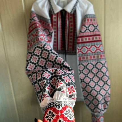 Ukrainian embroidered blouse with red and black geometric patterns