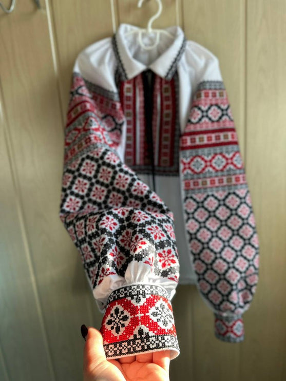 Ukrainian embroidered blouse with red and black geometric patterns