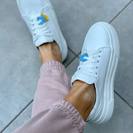 White leather women's sneakers with white sole