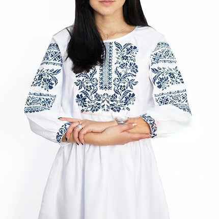White women's dress with embroidery