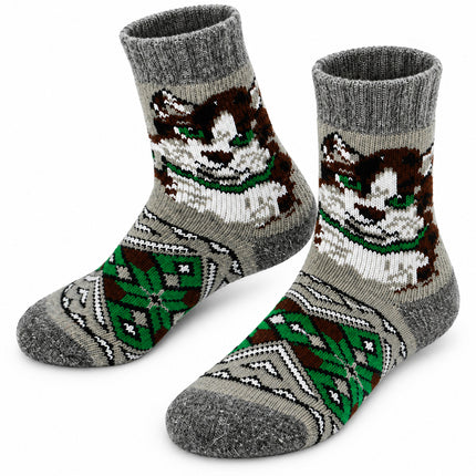 Women’s gray sheep wool socks with a black and white cat face and green folk ornament on the foot, made in Ukraine