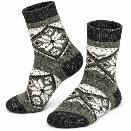 Women’s gray sheep wool socks with white snowflakes and Nordic-style ornament and dark gray cuffs, made in Ukraine
