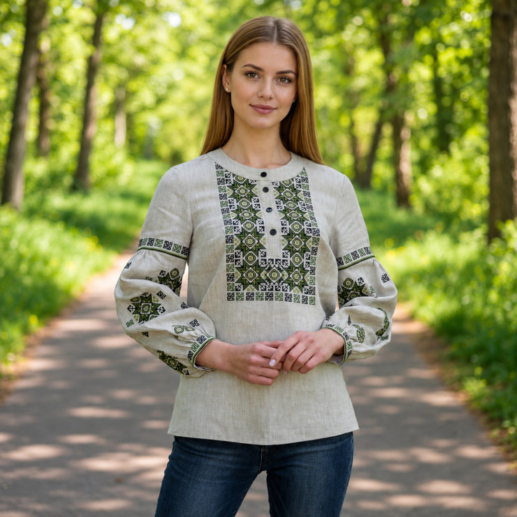 Women’s unbleached linen Ukrainian vyshyvanka blouse with green and black geometric embroidery and button neckline