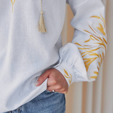 Women's embroidered blouse in Ukrainian style with a wheat ear
