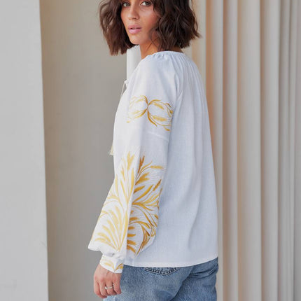 Women's embroidered blouse in Ukrainian style with a wheat ear