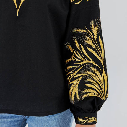 Women's embroidered blouse in Ukrainian style with a wheat ear