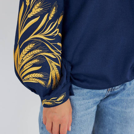 Women's embroidered blouse in Ukrainian style with a wheat ear