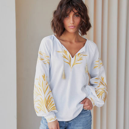 Women's embroidered blouse in Ukrainian style with a wheat ear