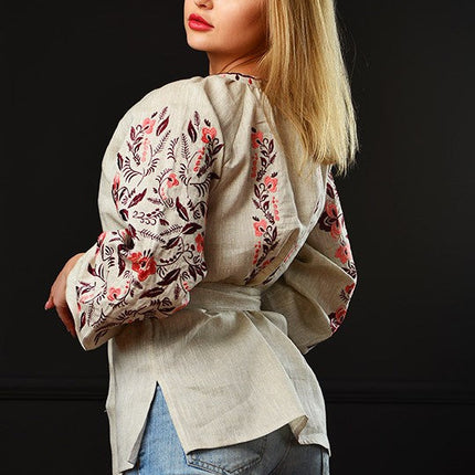 Women's blouse with floral embroidery pattern