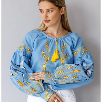 Women's embroidered blouse with swallows and ears of wheat