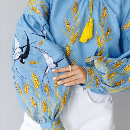 Women's embroidered blouse with swallows and ears of wheat