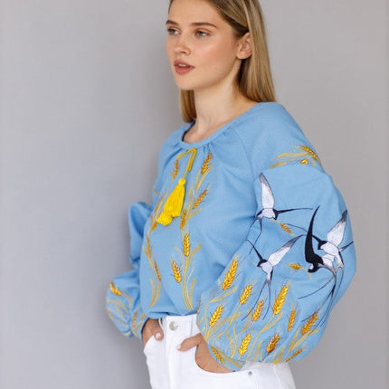 Women's embroidered blouse with swallows and ears of wheat