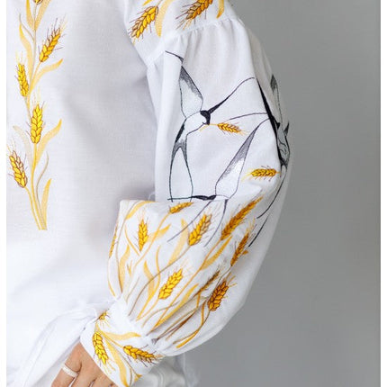 Women's embroidered blouse with swallows and ears of wheat