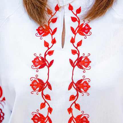Women's embroidered shirt with a blooming ornament