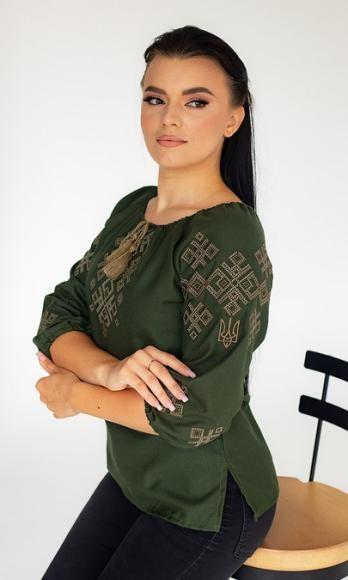 Women's vyshyvanka blouse with embroidered Ukrainian symbols
