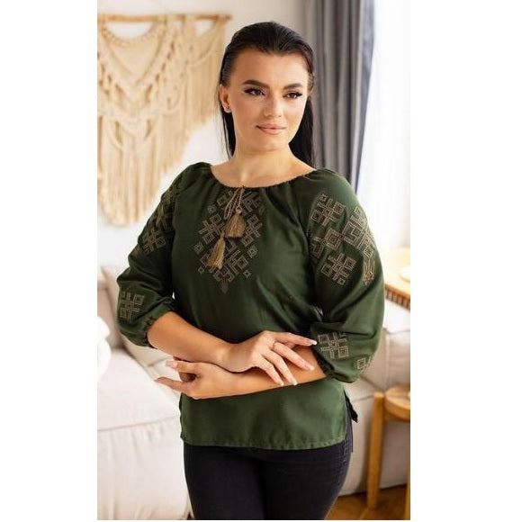 Women's vyshyvanka blouse with embroidered Ukrainian symbols