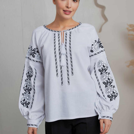 Embroidered women's blouse with a floral pattern